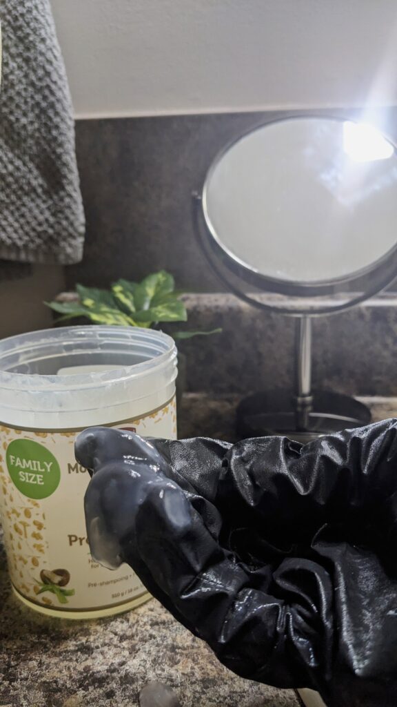 African Pride Pre-Shampoo Moisture Miracle Aloe & Coconut Water product texture shot